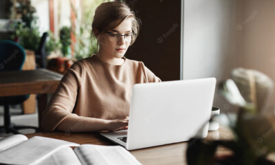 A Professional Translator Working on the laptop